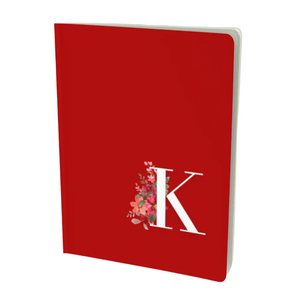 K monogram notebook in red with a floral element.