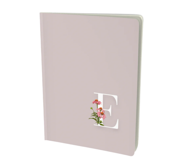 E monogram notebook in taupe with a floral embellishment.