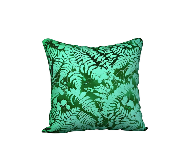 A square throw pillow cover featuring a vibrant green fern pattern, set against a plain white background - fern cushion cover from Spruce and Heron.