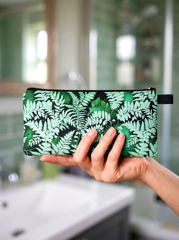 Fern Pencil Case - Fern Makeup Case - Cloth - From Spruce and Heron in a faceless woman's hand. 