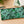 Fern Pencil Case from Spruce & Heron on a light table with pencils and notebooks. 