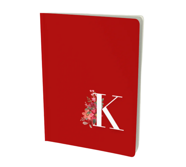 K monogram notebook in red with a floral element.