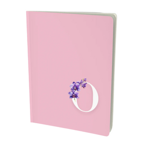 O monogram notebook in pink with floral embellishment.