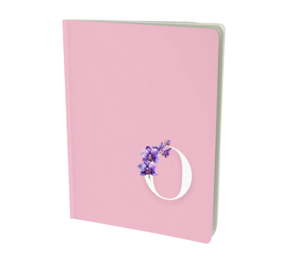 O monogram notebook in pink with floral embellishment.