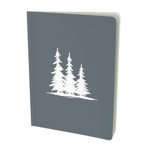 A dark gray hardcover notebook featuring a white line art illustration of four pine trees on the front cover, shown at a three-quarter angle against a light gray background - Spruce Trees Notebook - Minimalist in Charcoal from Spruce and Heron. 