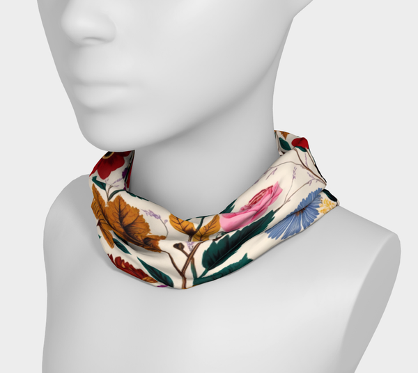 Mannequin wearing a floral patterned scarf on a white background